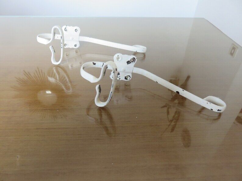 Pair of white metal hooks 30s 40s