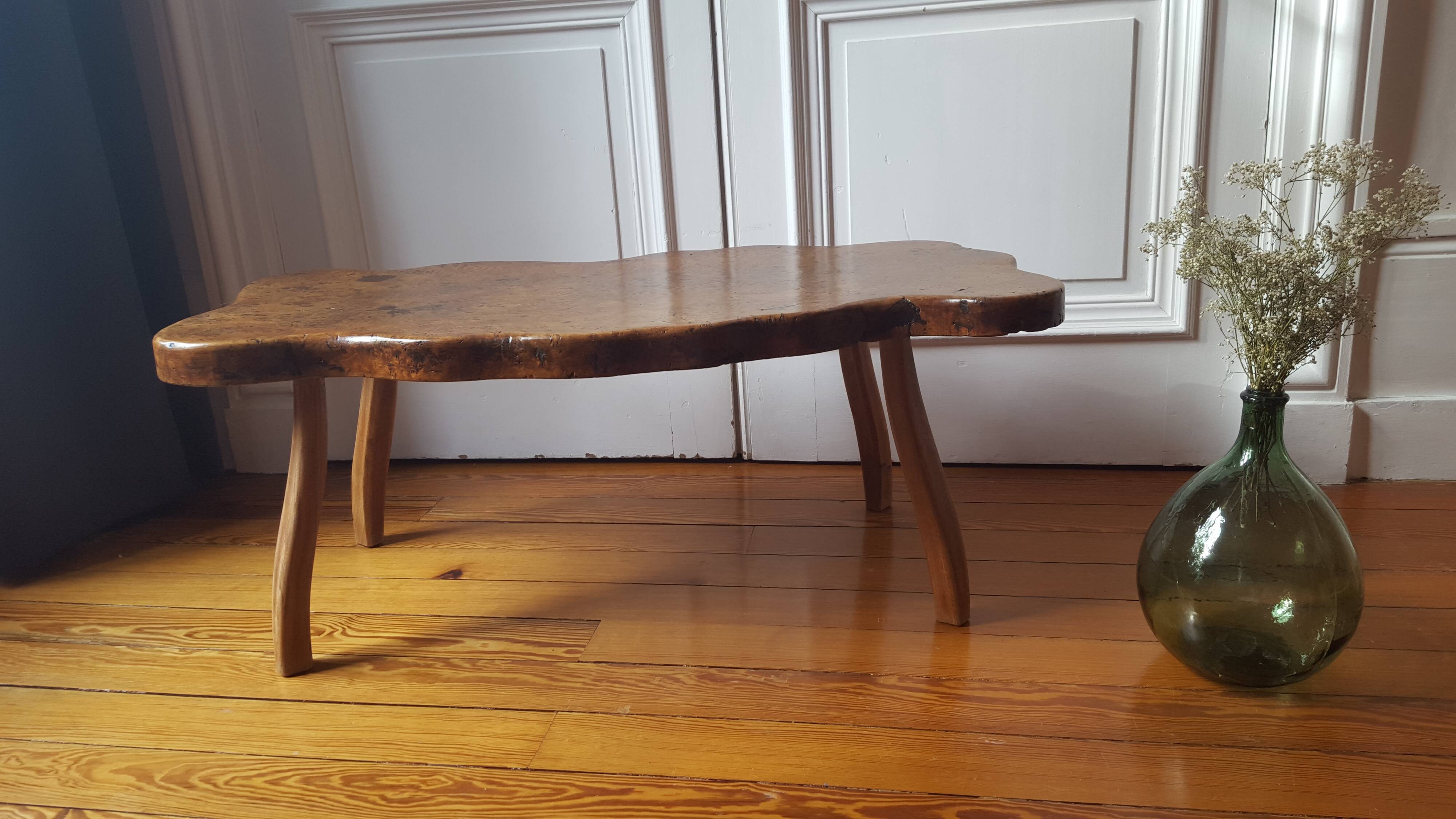 Table low 70s in solid wood tree trunk