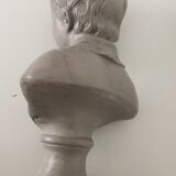 Cherub bust in platter