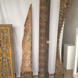 Rectangular Indonesian construction element with blue and yellow plant in carved wood