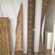 Rectangular Indonesian construction element with blue and yellow plant in carved wood