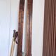 Antique wooden skis with vintage poles