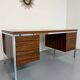 Vintage desk with rosewood veneer and chrome metal design from the 1970s.