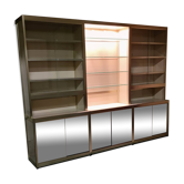 Ivory-colored and matte gold anodized aluminum display bookcase