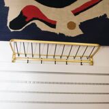 Wall coat rack made of brass