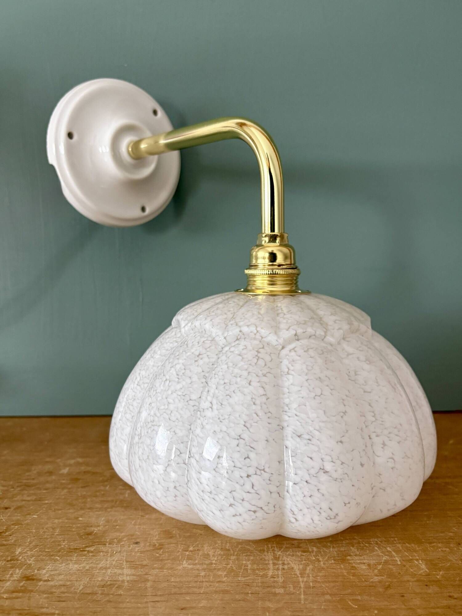 Vintage glass wall light with a curved arm from Clichy, white.
