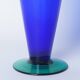 Blue glass vase with green foot