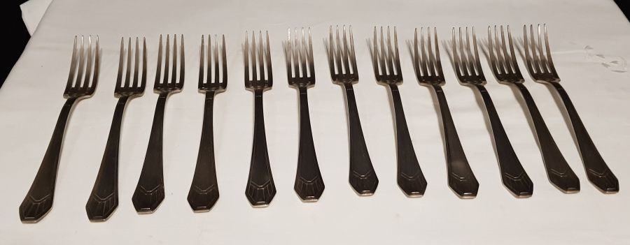23-piece silver metal art deco cutlery set