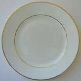 Suite of twelve table plates in white and gold porcelain.