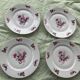Set of 4 flat plates, in art deco porcelain