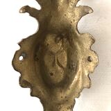 Figurative decoration in metal