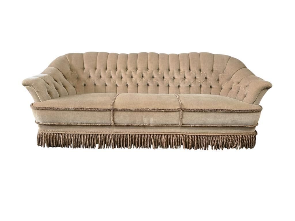 Canapé vintage beige avec franges