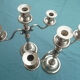 Pair of silver-colored metal candlesticks