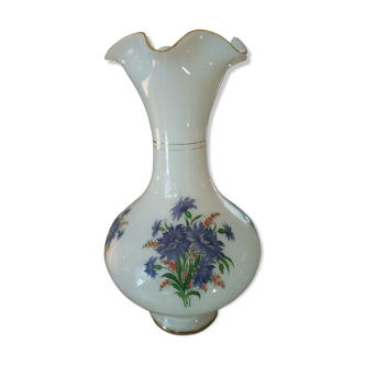 White glass vase decorated with blue flowers