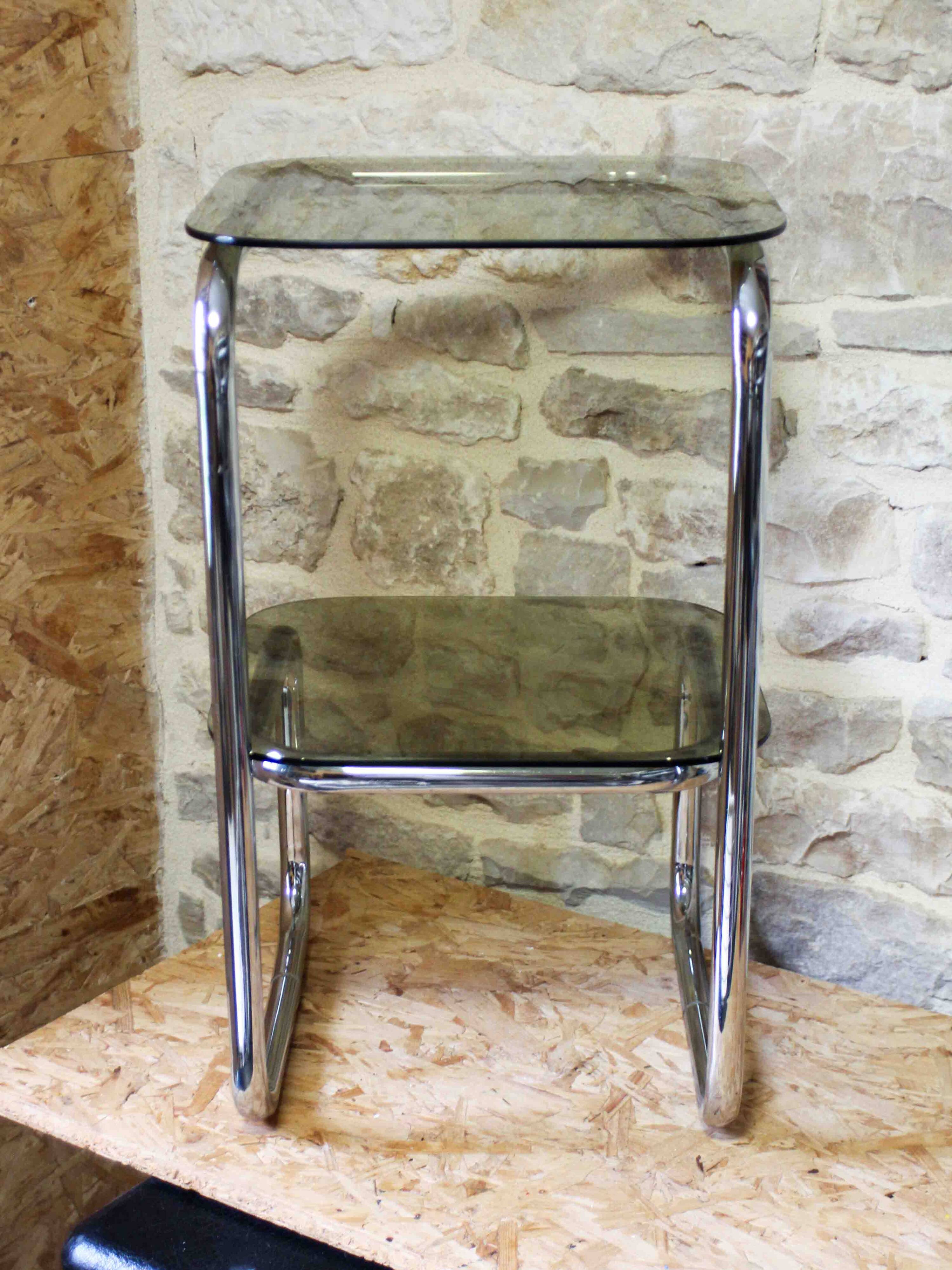 Chrome metal and smoked glass side table.