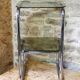 Chrome metal and smoked glass side table.