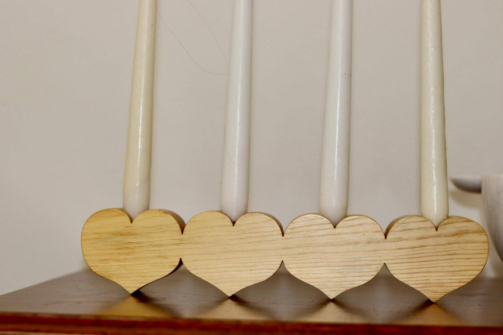 Heart-shaped chandelier made of Swedish pine wood.