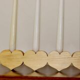 Heart-shaped chandelier made of Swedish pine wood.