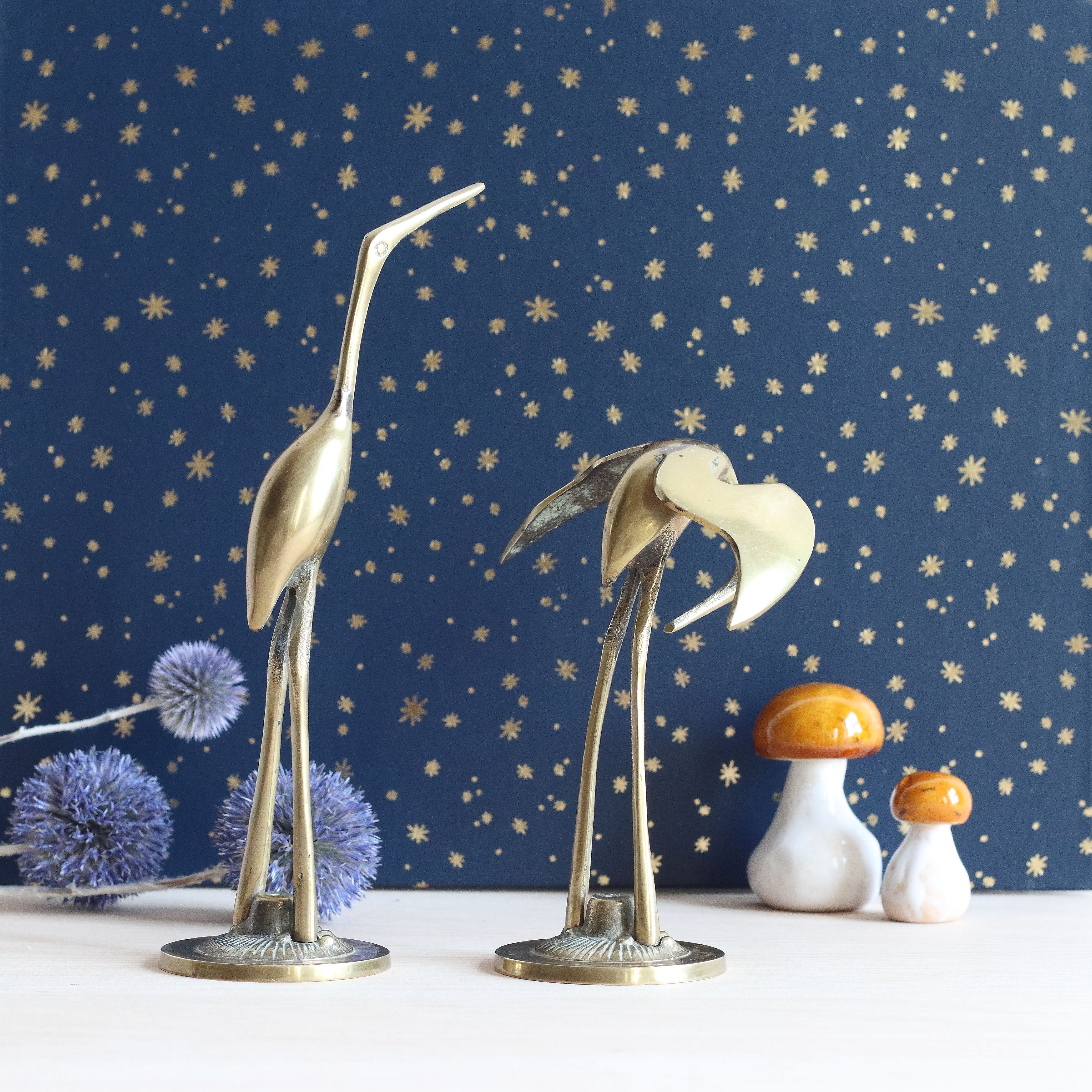 Couple of herons, golden brass