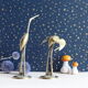 Couple of herons, golden brass