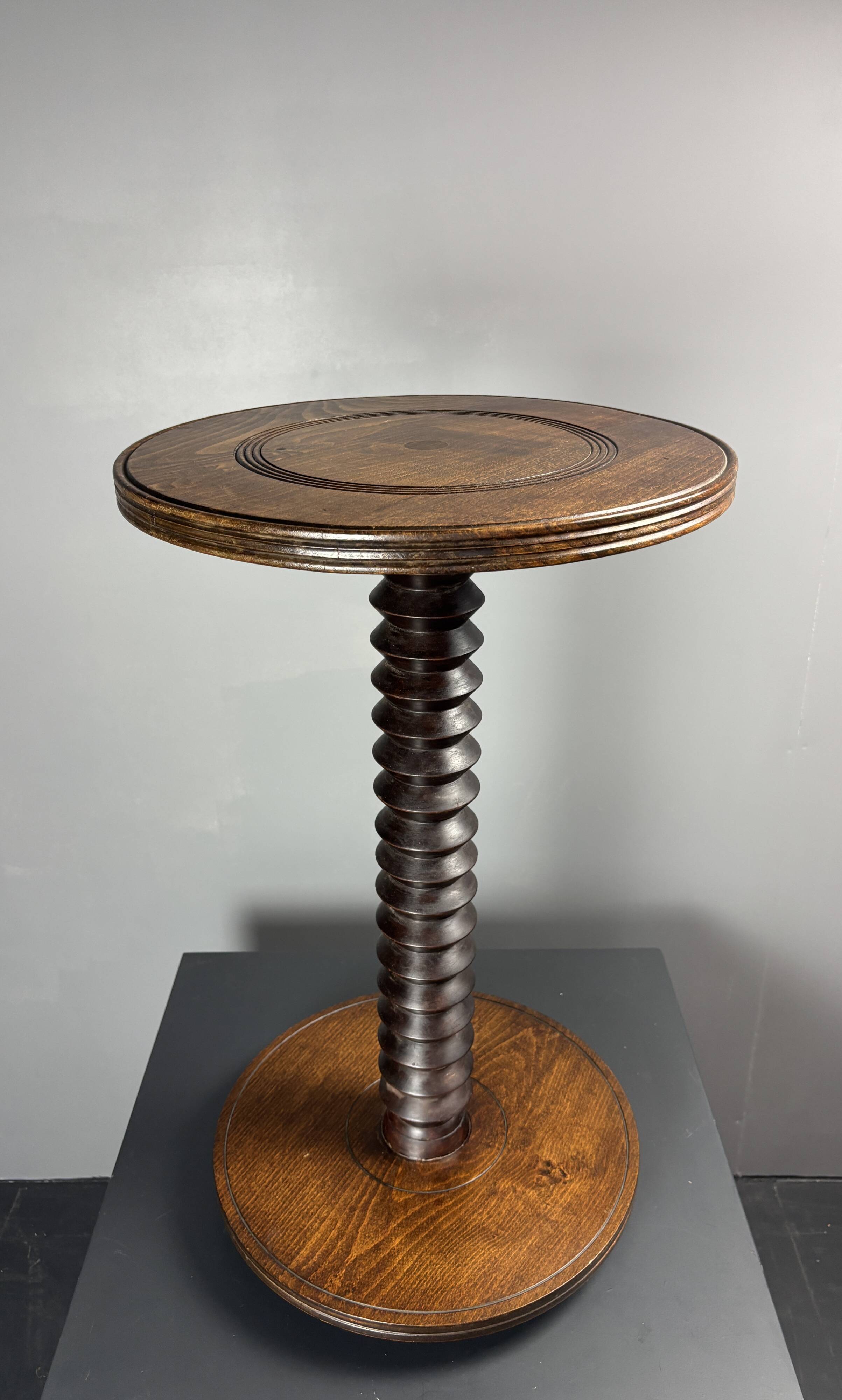 Midcentury brutalist wood turned side table in the style of Charles Dudouyt