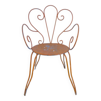 Orange wrought iron chair