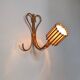 Rattan wall lights by Louis Sognot