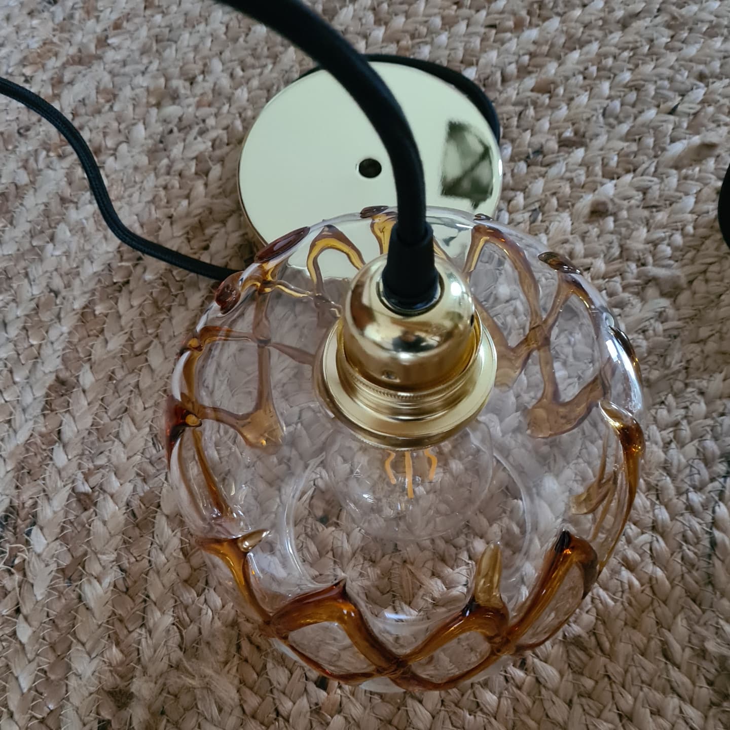 Amber blown glass suspension