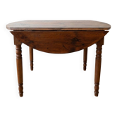 Antique dining table with drop leaves, wood.