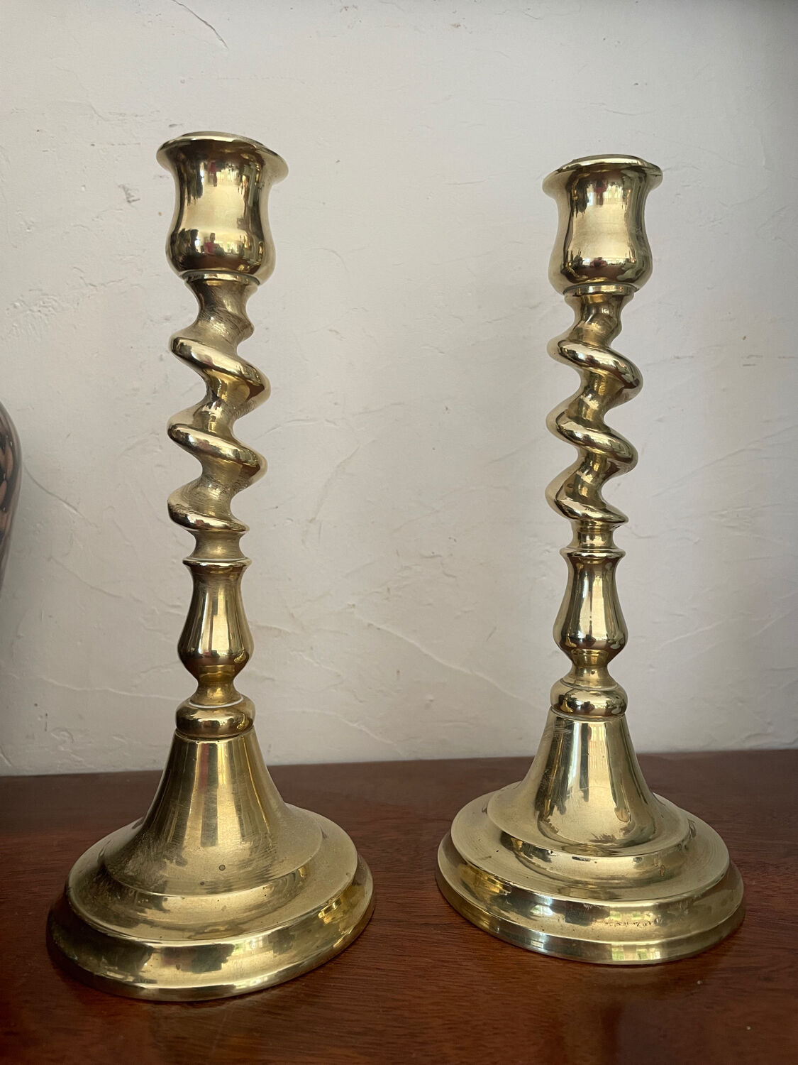 Pair of twisted solid brass candle holders