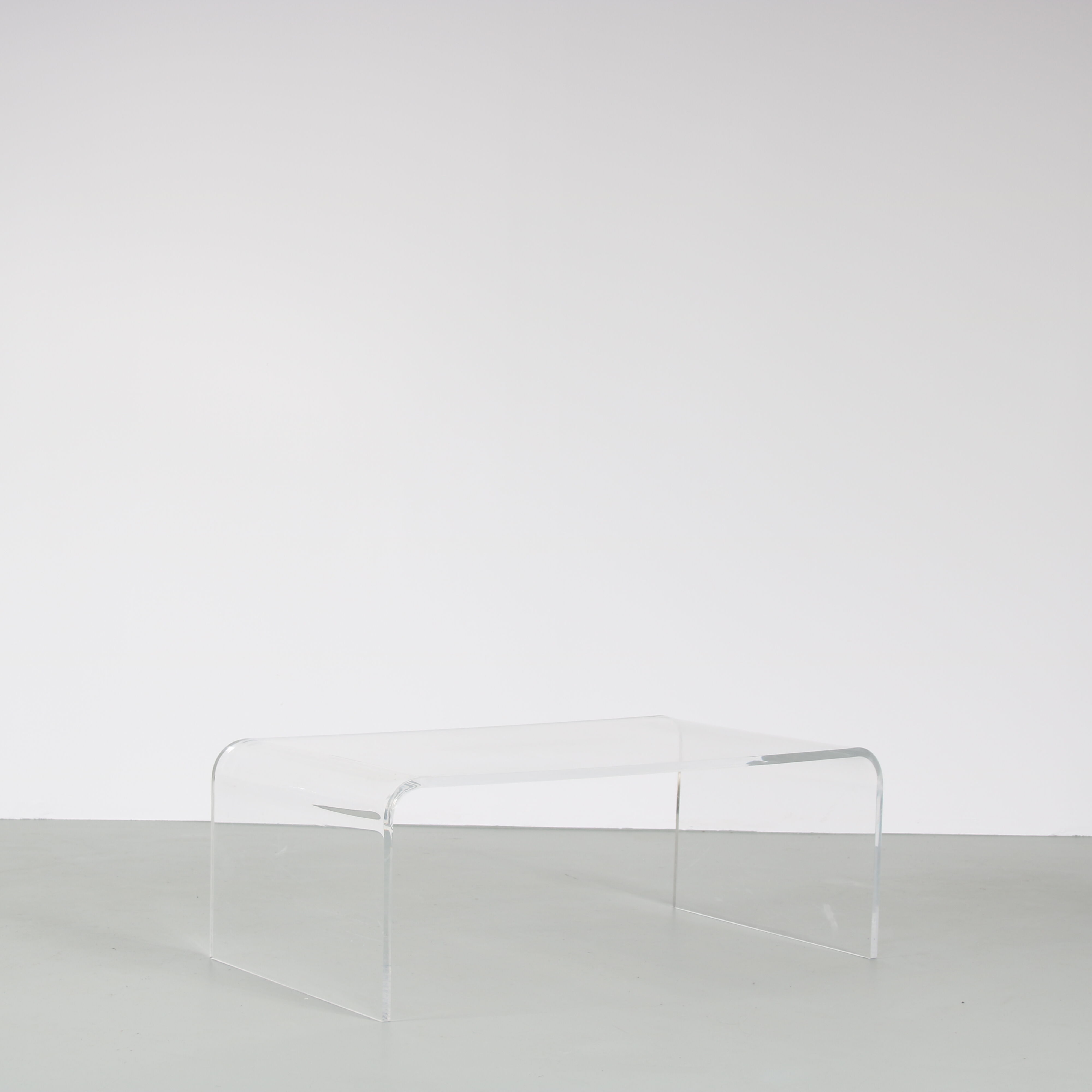 1970s Bent plexiglass coffee table from France