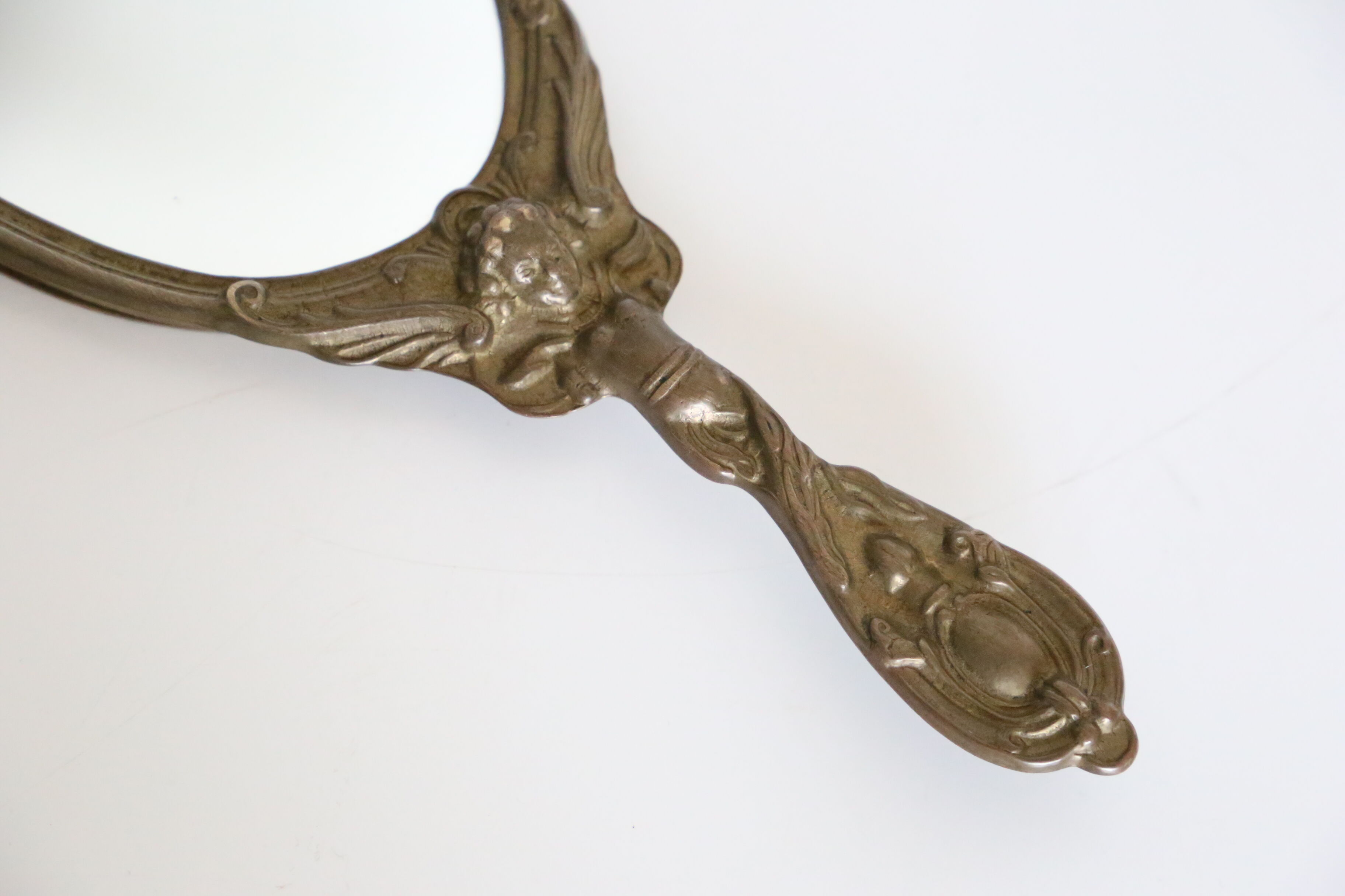 Brass hand mirror