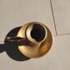 Brass table candle holder with candle push system
