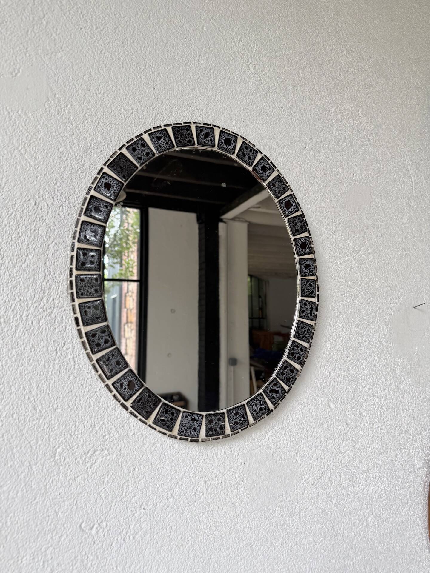 Oval ceramic mosaic mirror from the 50s/60s.