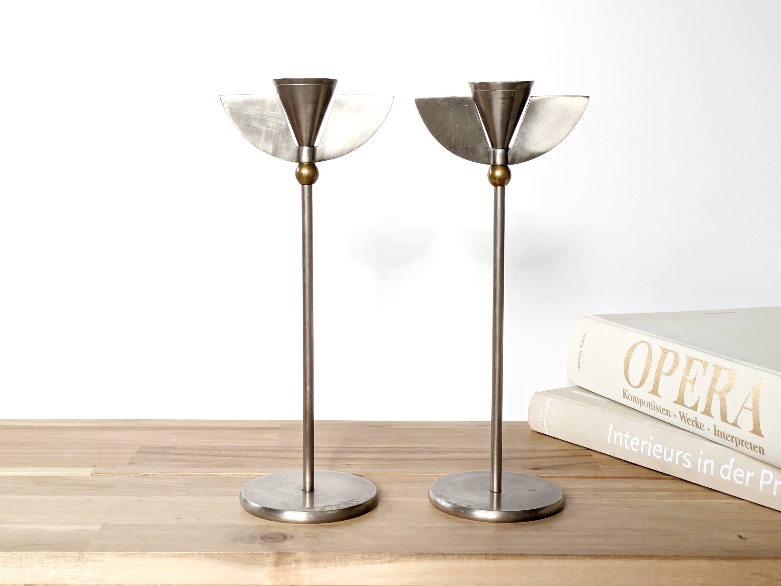 Pair of postmodern 1980s candlesticks, stainless steel and brass