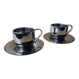 Two vintage mid century modern stainless steel coffee cups with saucer