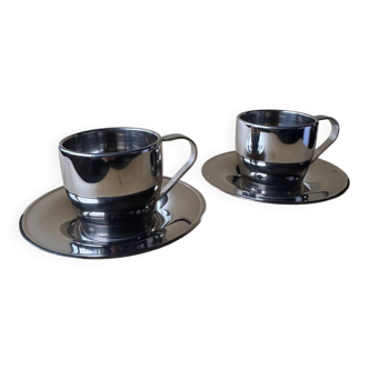 Two vintage mid century modern stainless steel coffee cups with saucer