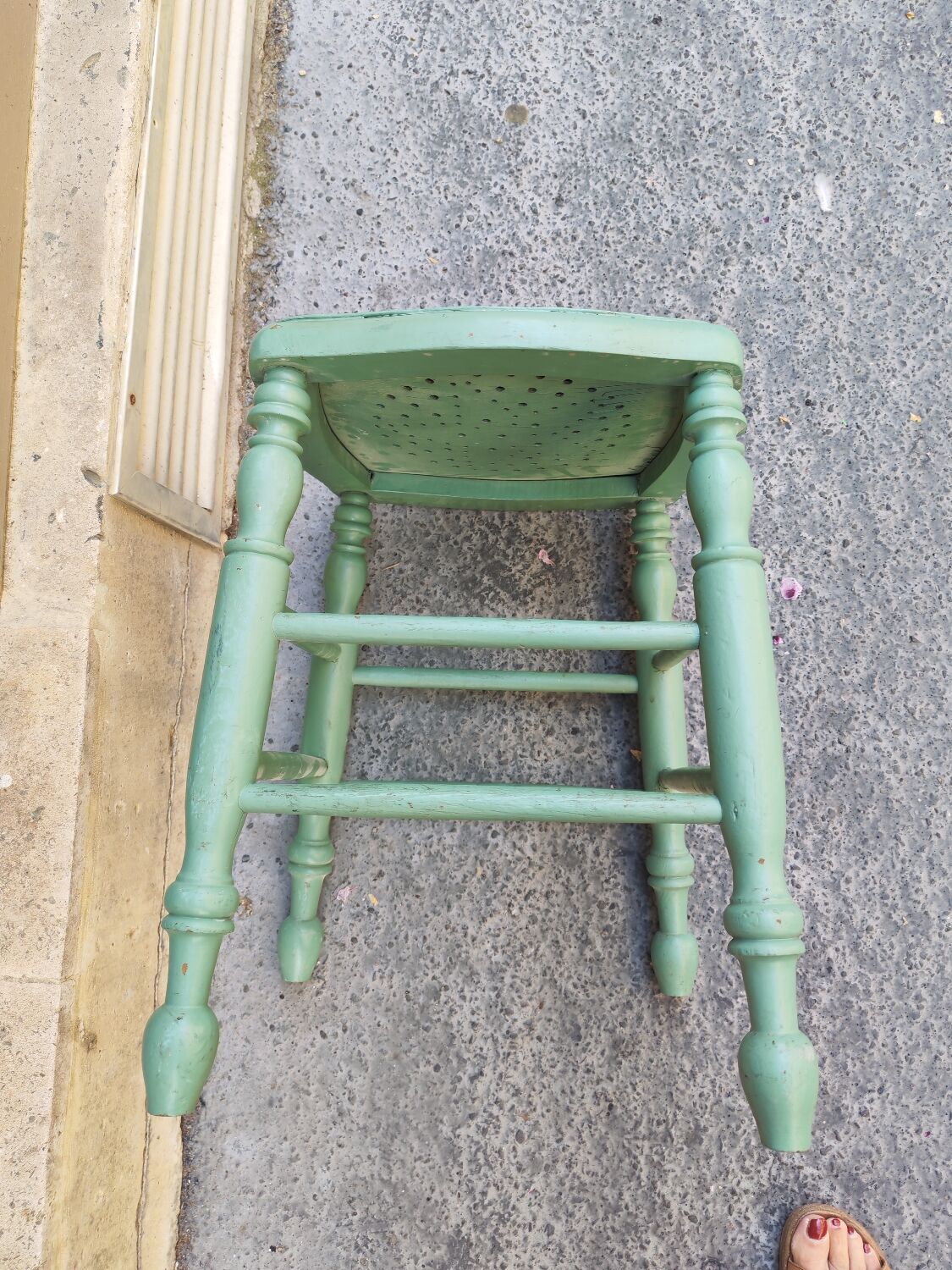 Antique green stool