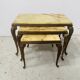 Set of three nesting tables in onyx and brass, 20th century.