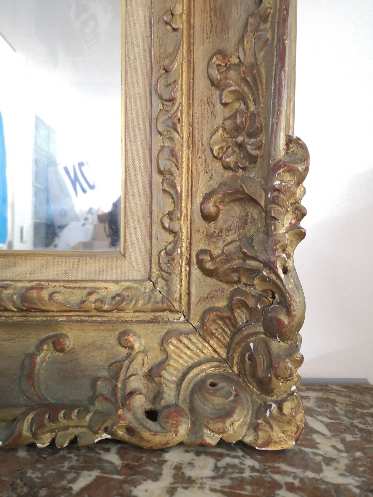 Carved and gilded wooden mirror early in the 20th century  - 96x76cm