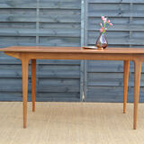 Single extension dining table by McIntosh