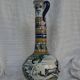 Vintage bottle vases in Talavera de la Reina earthenware.