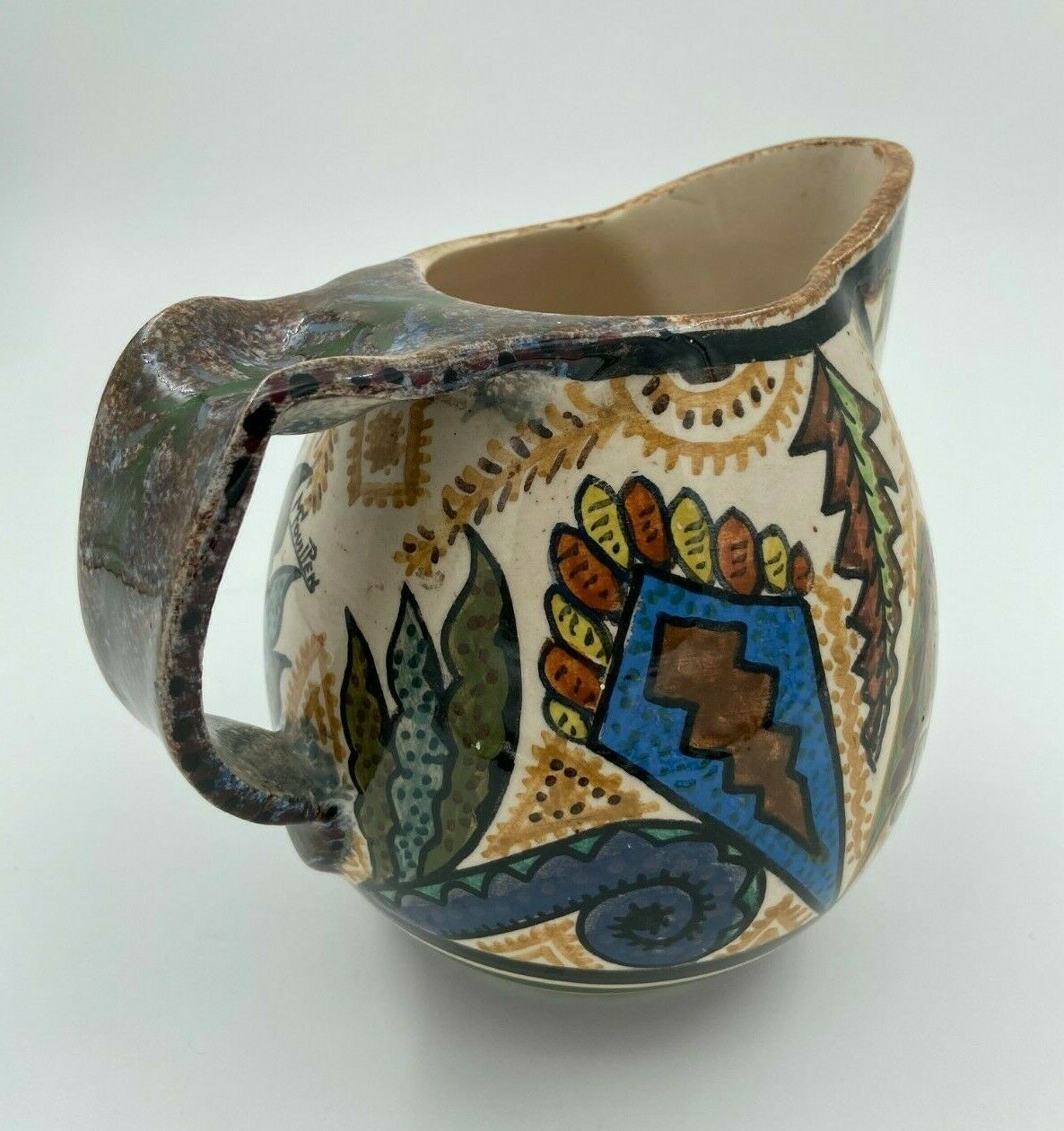 Pichet Paul Fouillen faience de Quimper decor geometrique signe