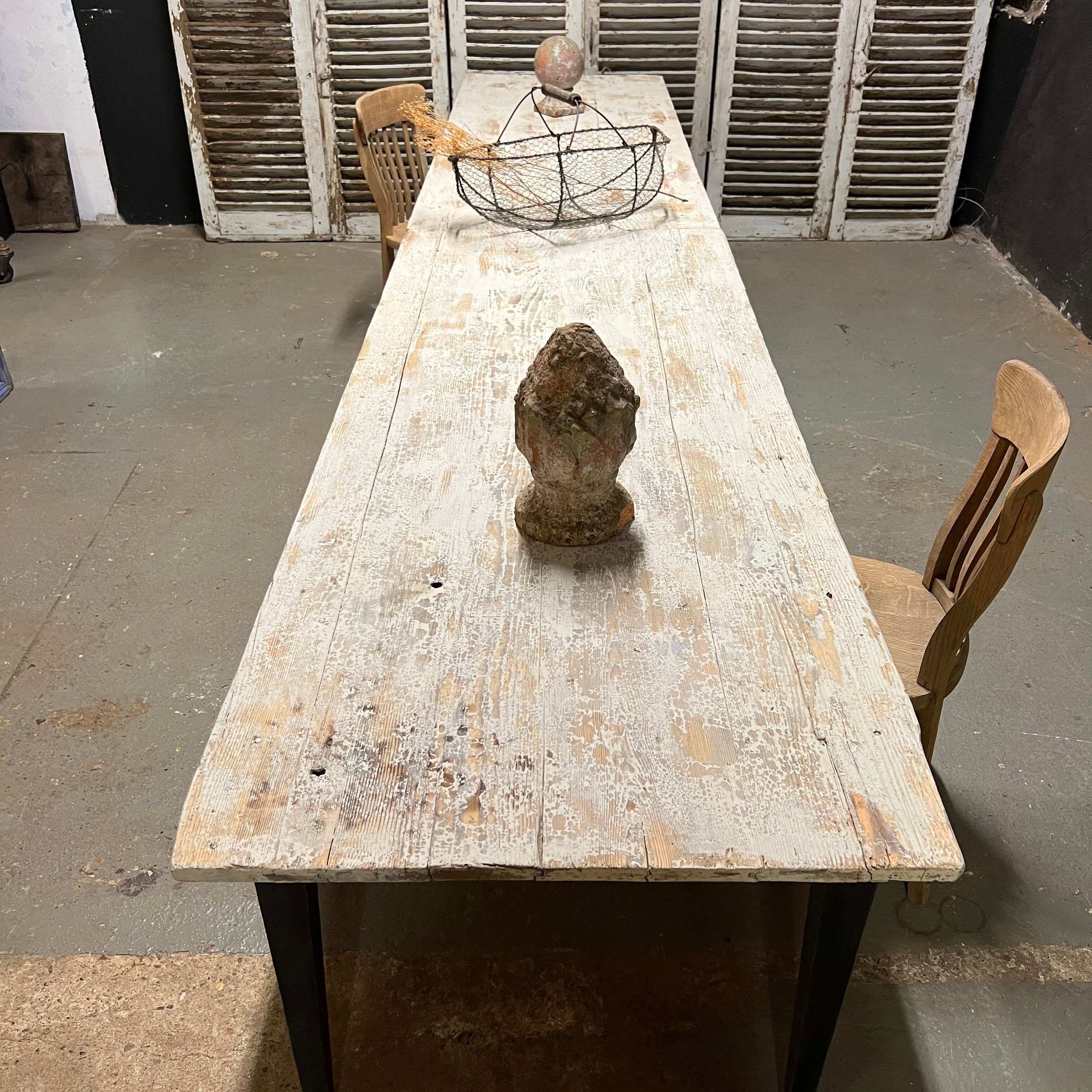 Black farmhouse table and white patinated top
