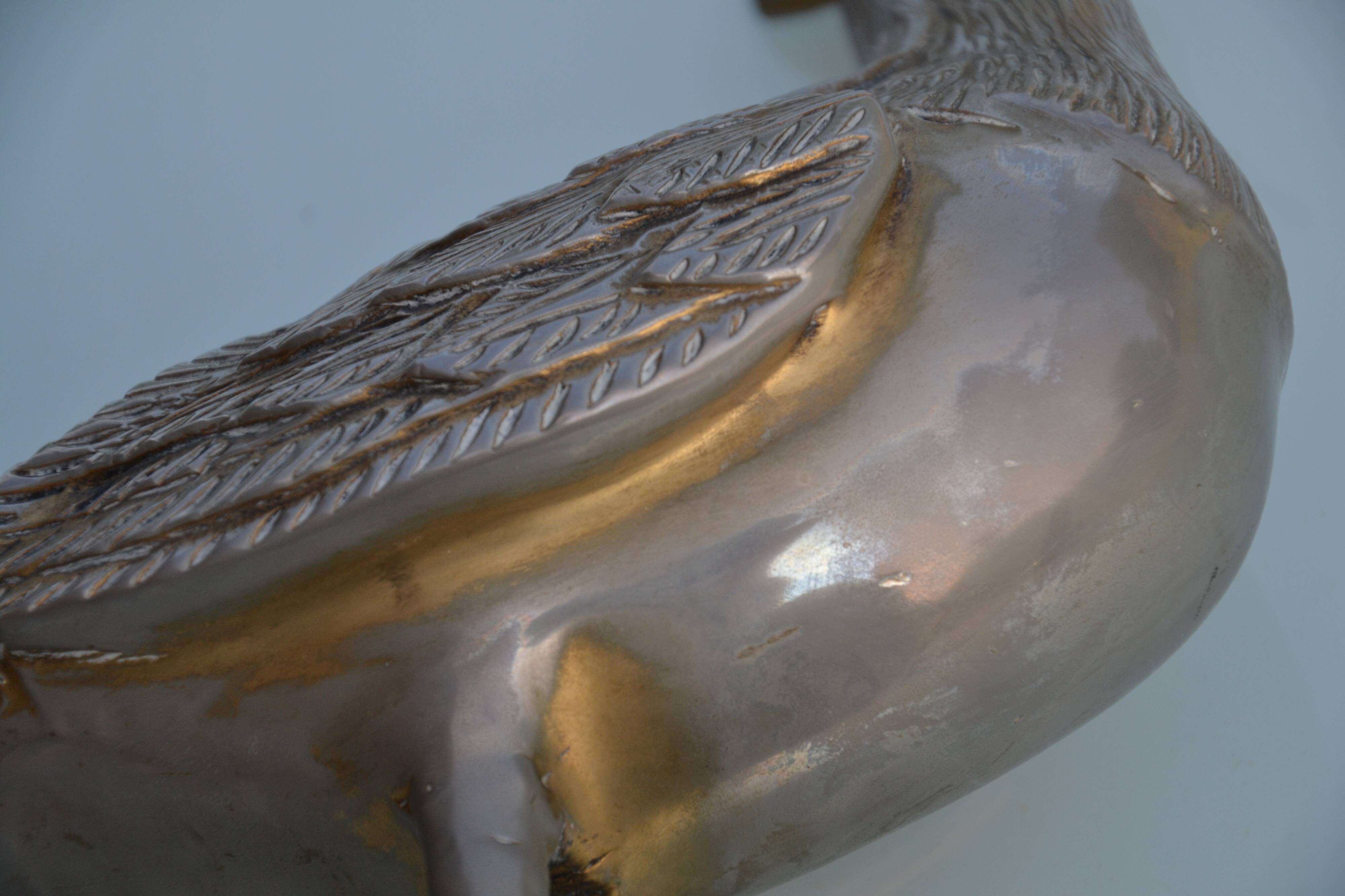 Brass peacock sculpture