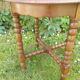 Side table with beaded legs