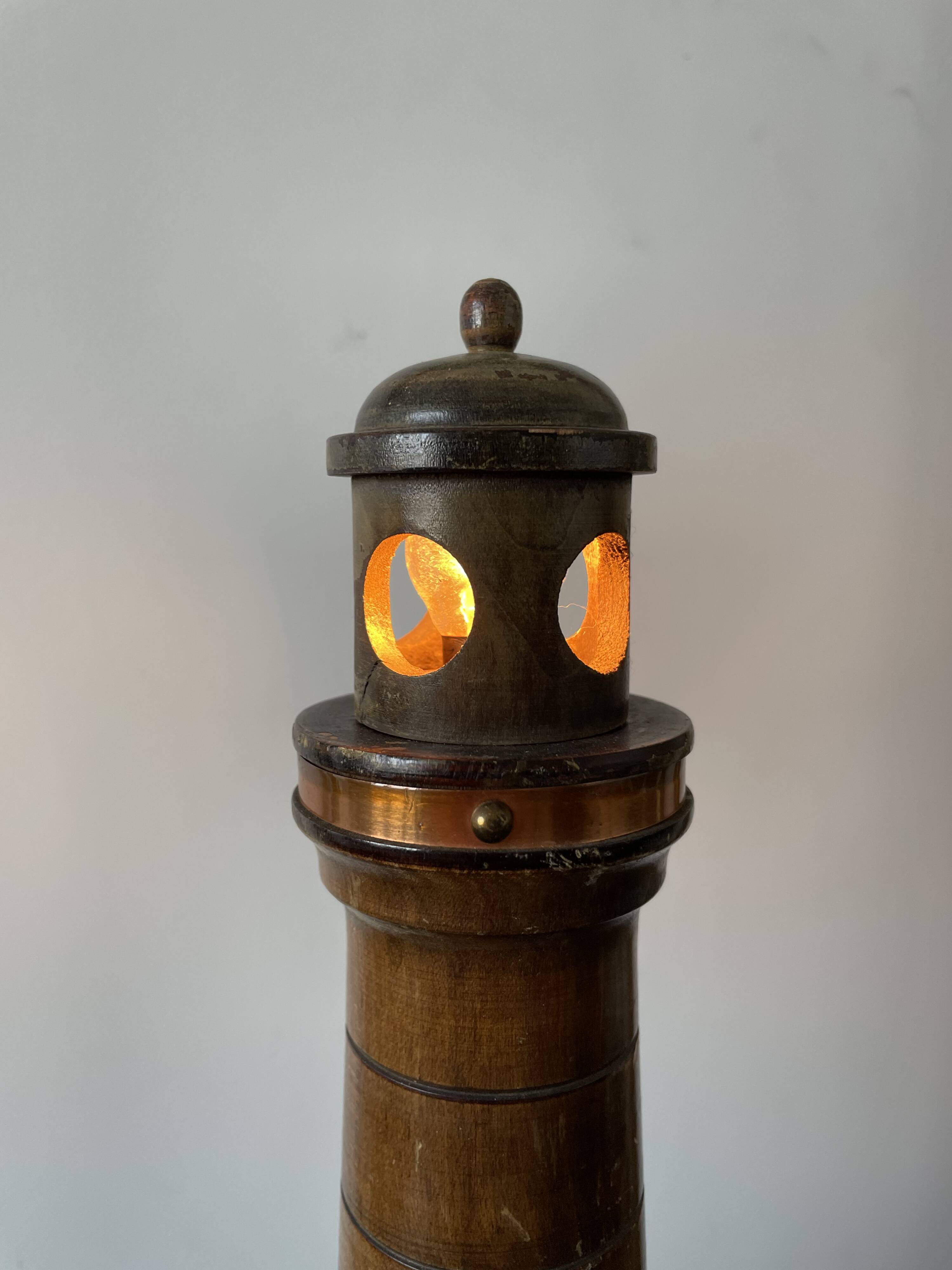 Souvenir lighthouse lamp from Calais in wood