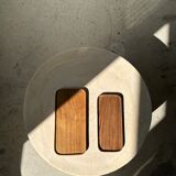 Trio of rounded rectangular trays or cups in monoxyl teak L:35