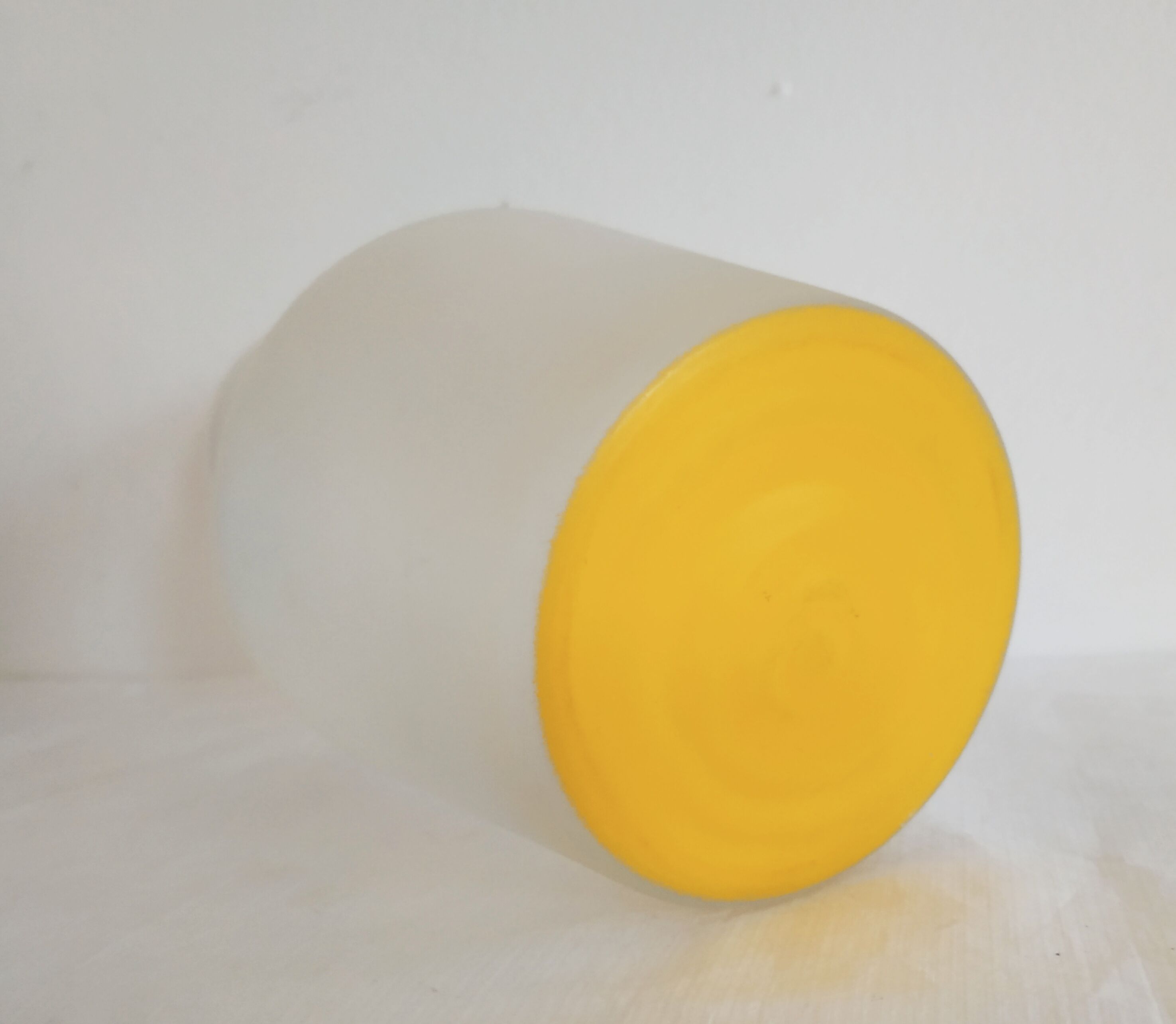 Frosted glass carafe with yellow bottom