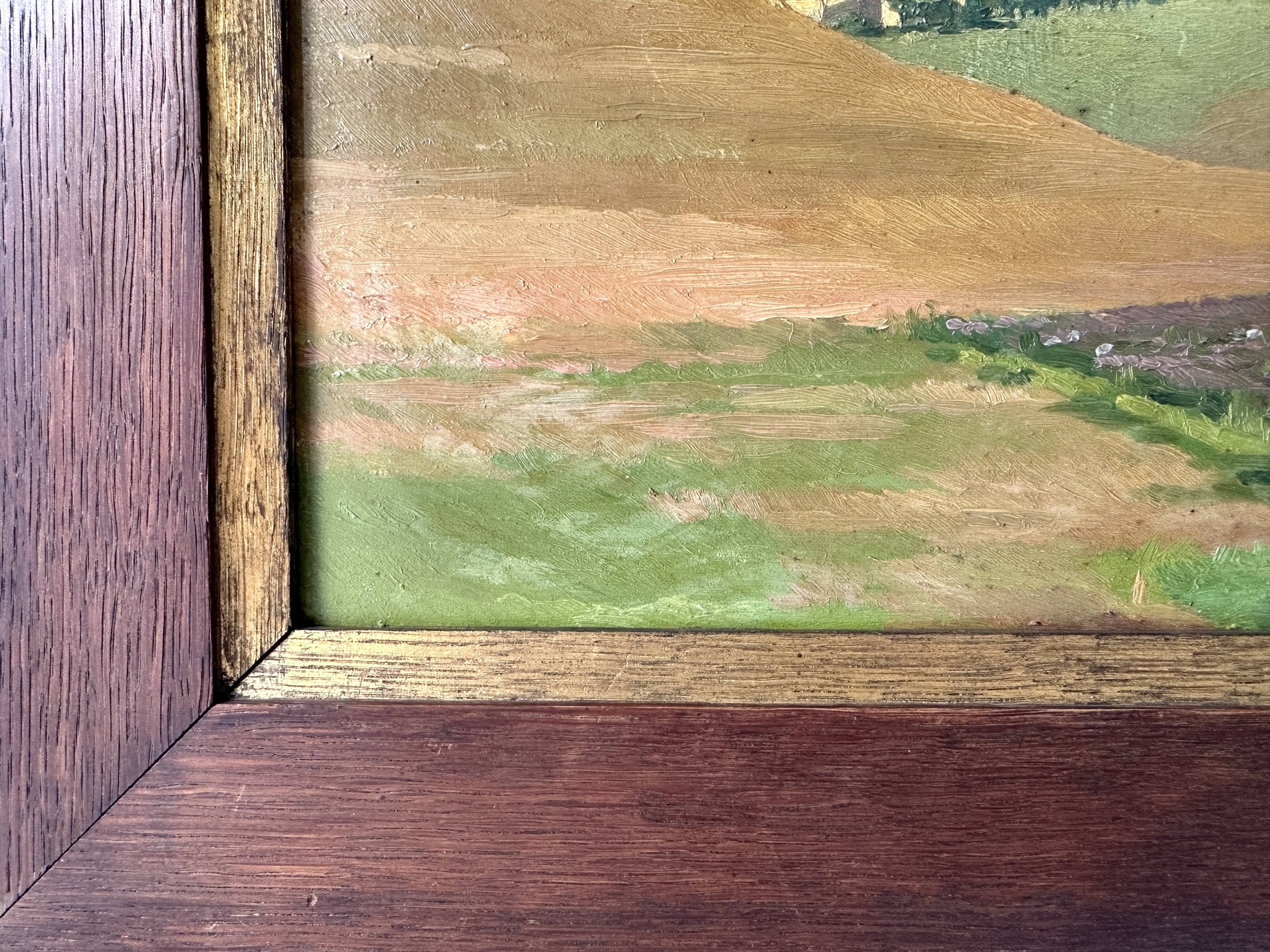 Old oil painting of a landscape on panel from 1920, haystacks.